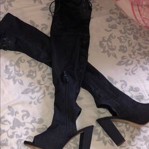 Blue denim high peep toe boots.
